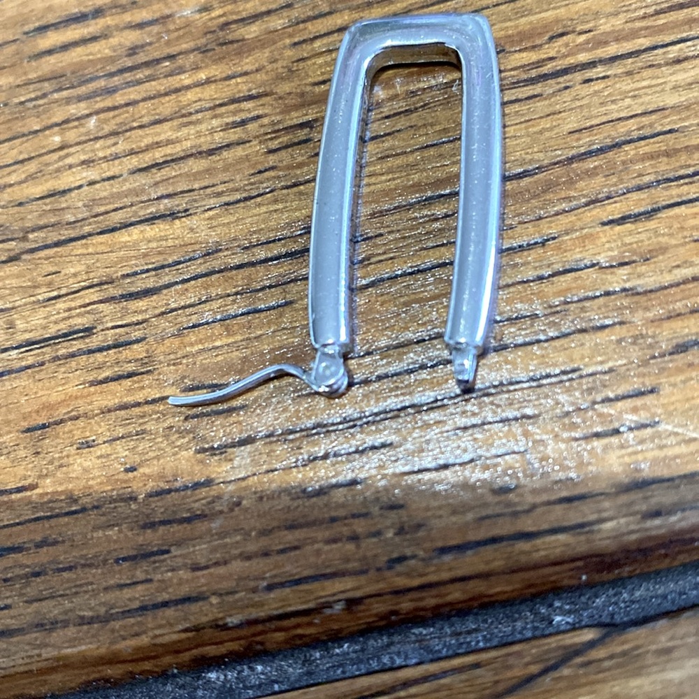 Silver 1.5 in rectangle pierced earrings. Very secure and light. They are pretty - Picture 10 of 12